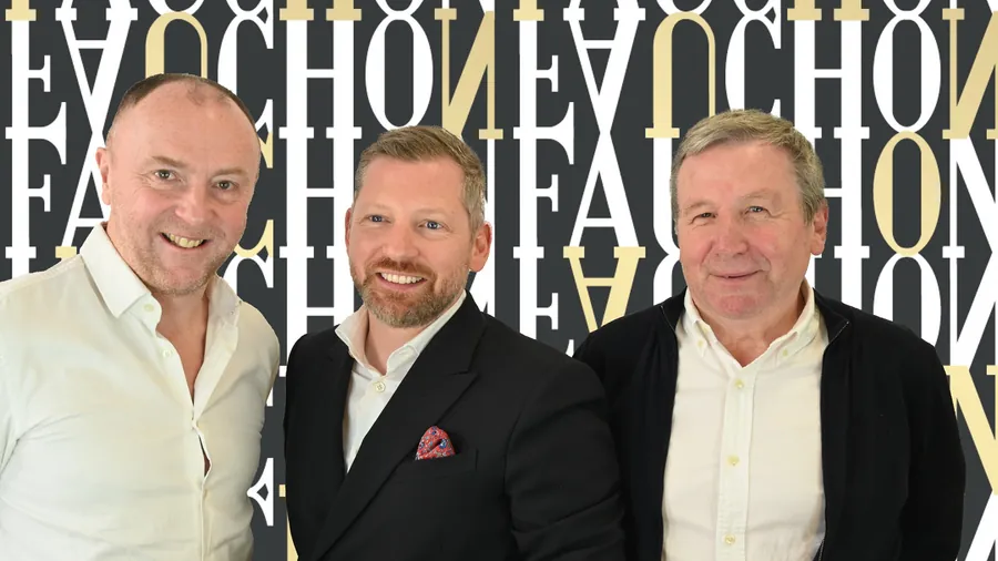 Arnaud Larher and Fauchon president Jérôme Tacquard with a third guest in front of a Fauchon logo wall