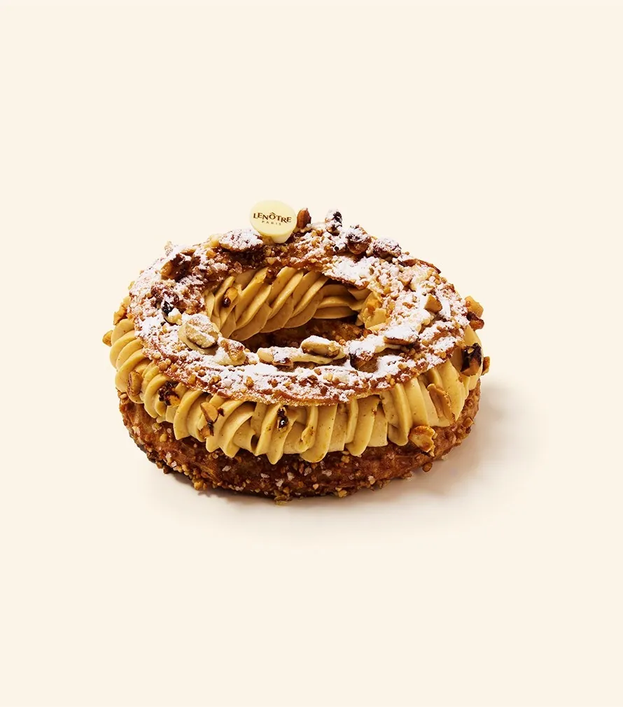 Lenôtre peanut Paris-Brest with caramelised peanut shards and icing sugar, photo by Lenôtre